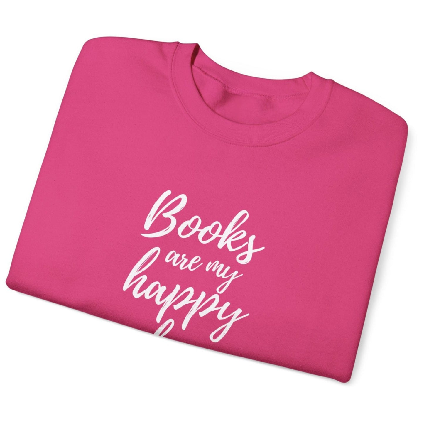 A pink sweatshirt with the text 'Books are my happy place'