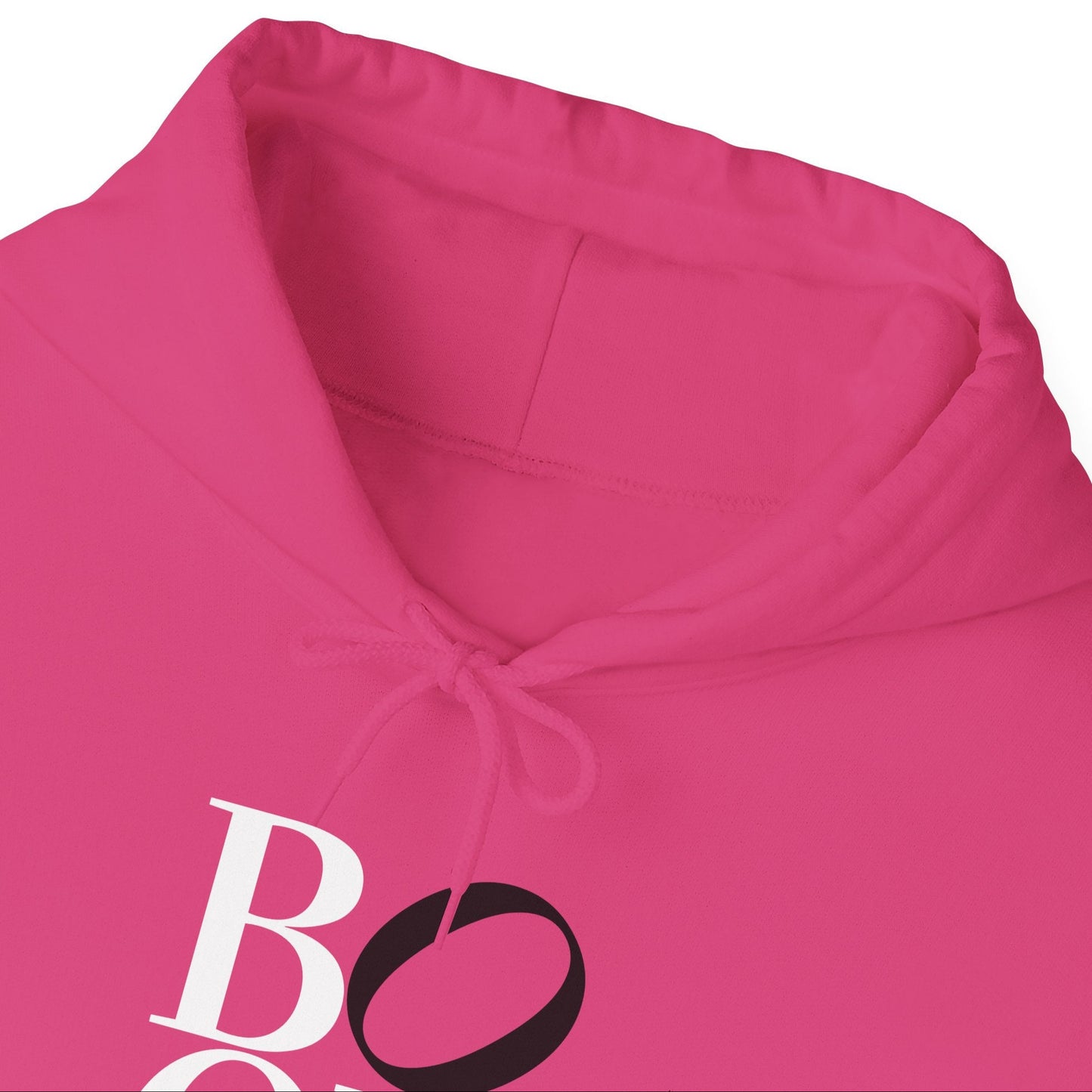Close-up of a pink hoodie with a logo on a white background