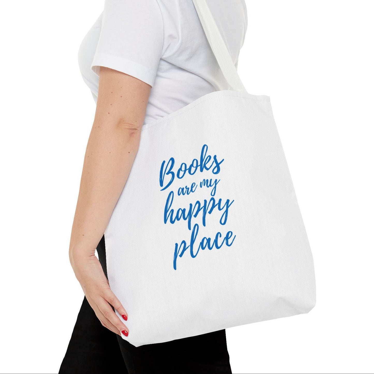 A white tote bag with the text 'Books are my happy place' printed in blue.