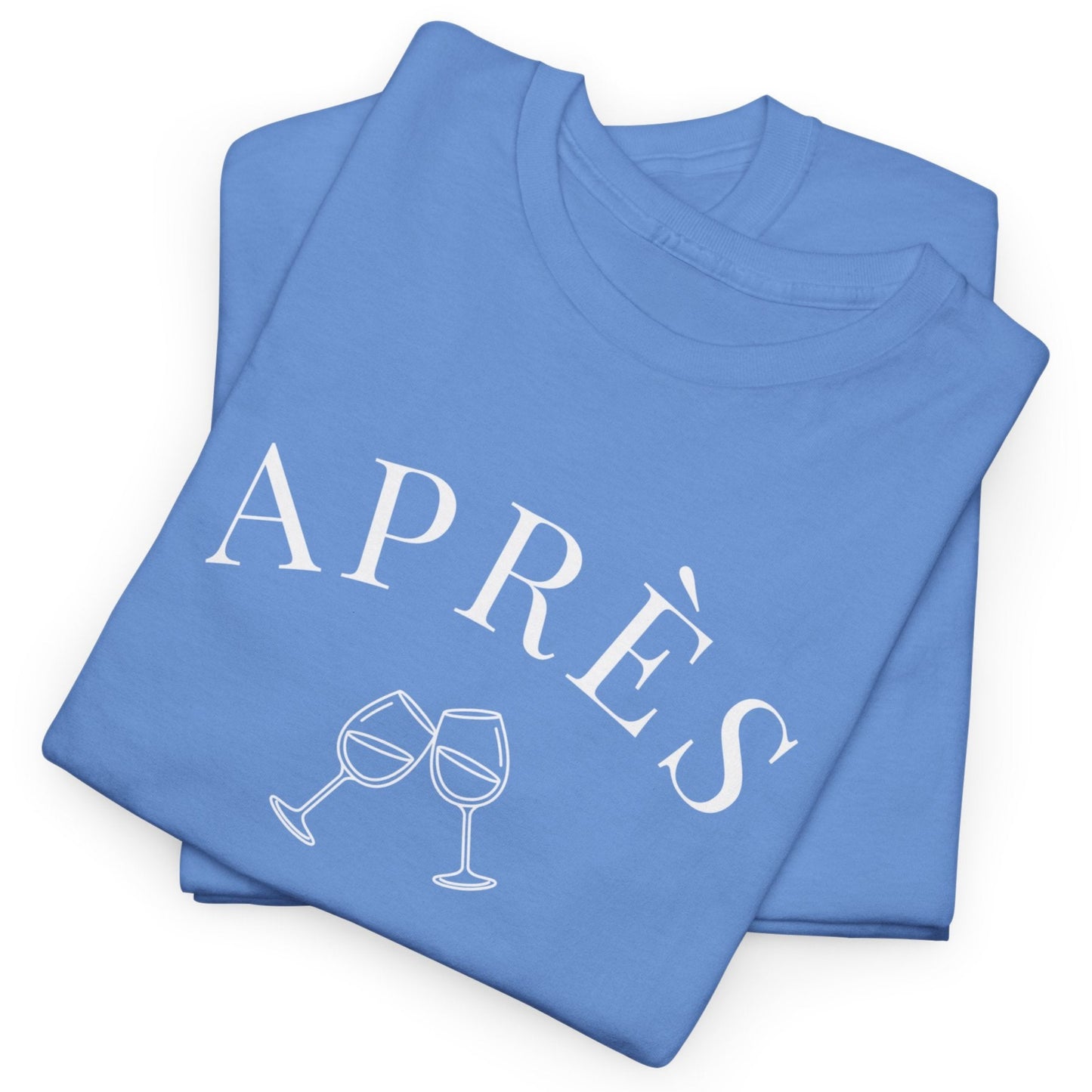 Folded blue t-shirt with 'APRÈS' and wine glass graphics on a white background