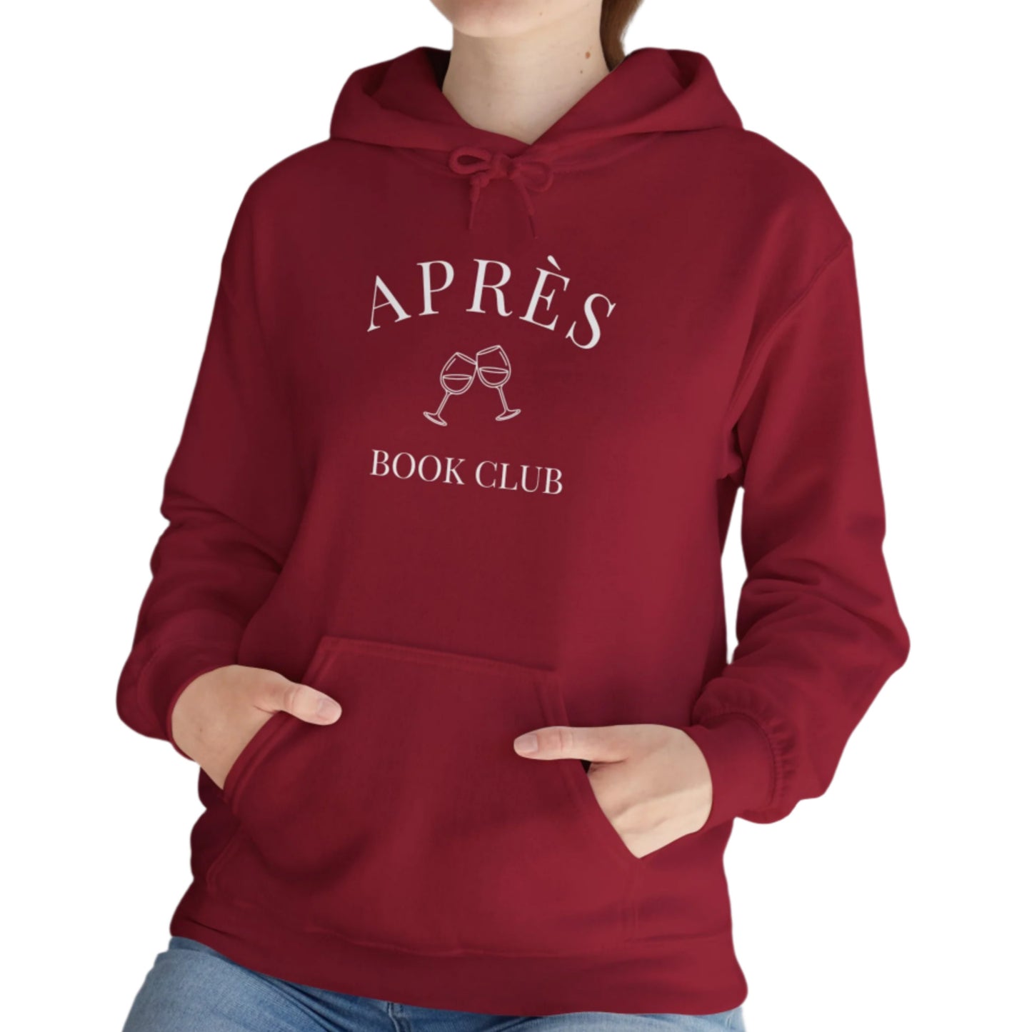 Red hoodie with 'Ap
es Book Club' text and wine glass graphics worn by a person indoors.