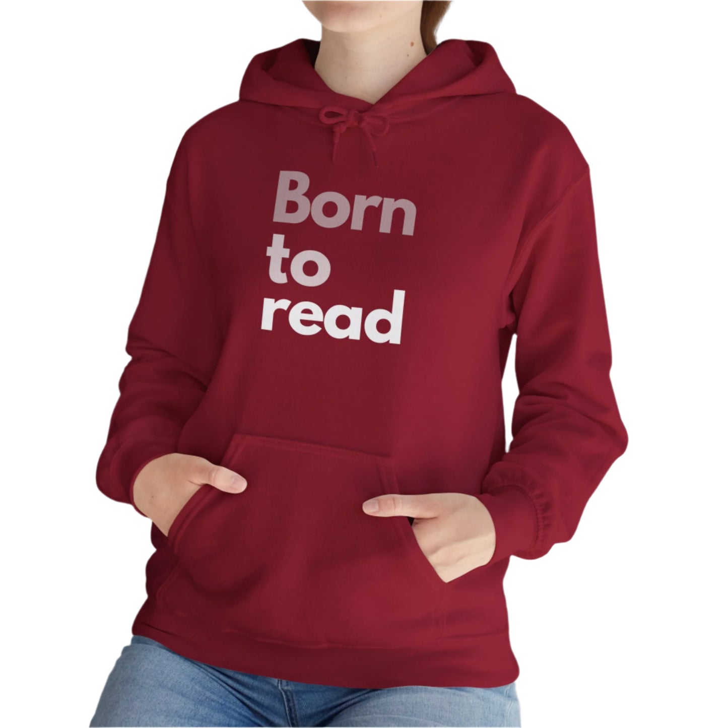 Person wearing a red hoodie with 'Born to read' text, standing indoors with a plant in the background.