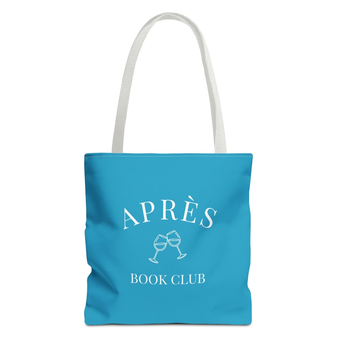 Blue tote bag with 'APRÈS BOOK CLUB' text and graphics on a white background