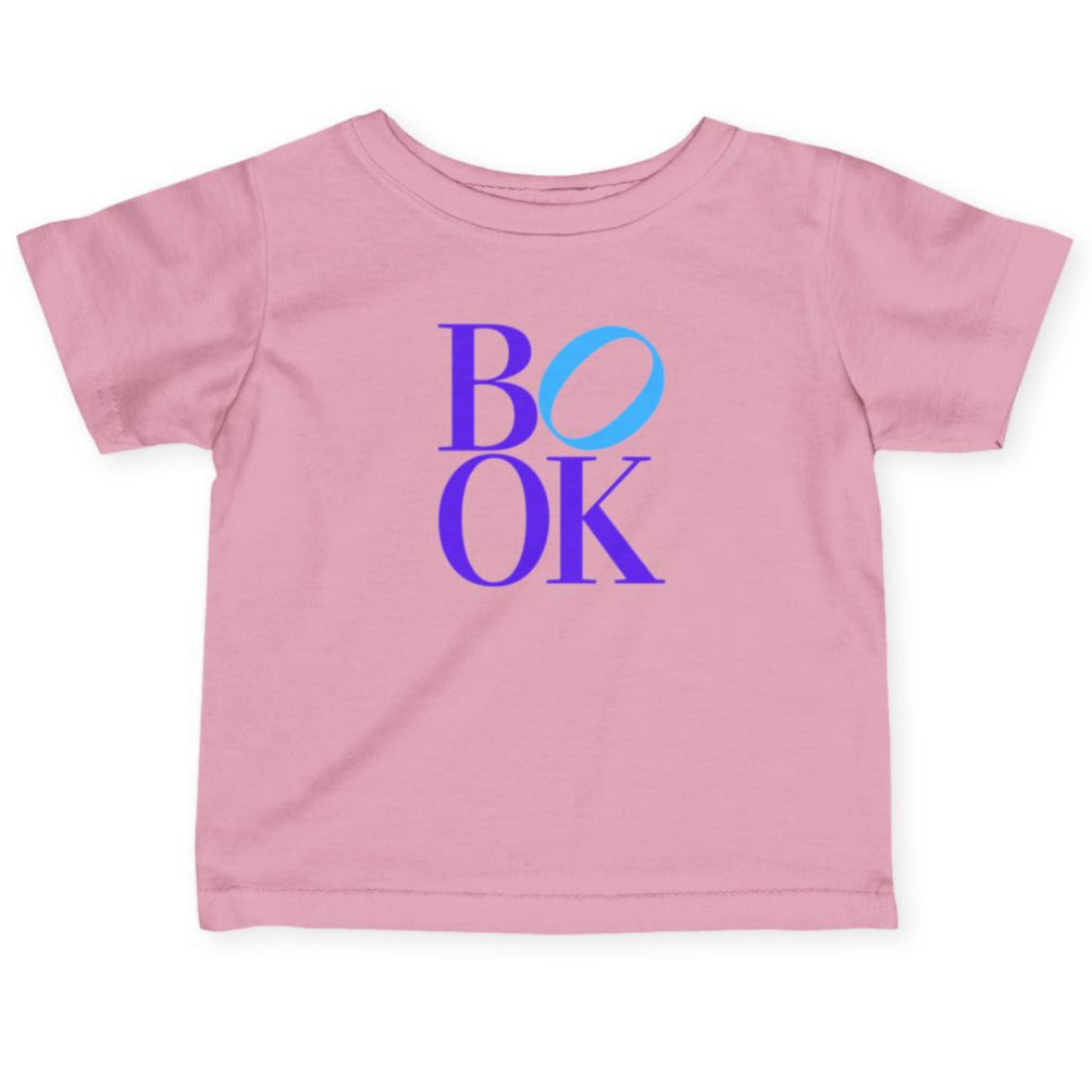 Pink t-shirt with 'BOOK' printed in blue and purple on a white background