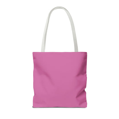 Pink tote bag with white handles on a white background