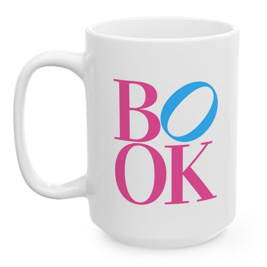 White mug with 'BOOK' in colorful letters on a white background
