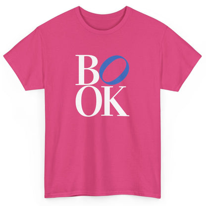 Pink t-shirt with 'BOOK' text on a white background