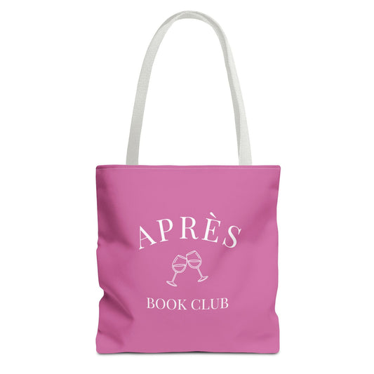 Pink tote bag with 'APRèS BOOK CLUB' text and wine glass graphics on a white background