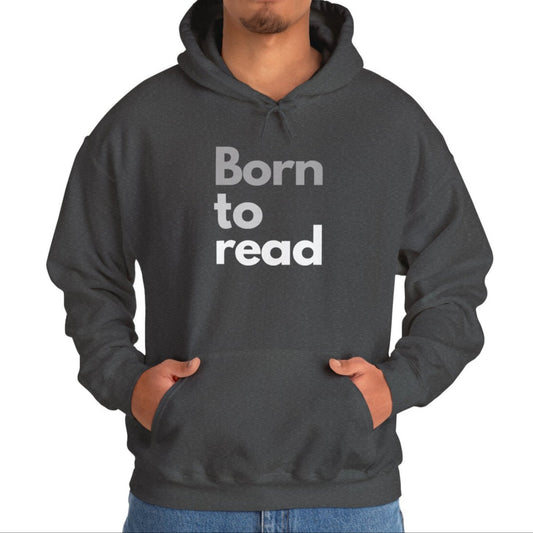 Person wearing a dark gray hoodie with 'Born to read' text on a white background