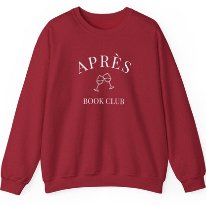 Red sweatshirt with 'APRèS BOOK CLUB' text and design on a white background