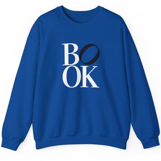 Blue sweatshirt with 'BOOK' printed on it against a white background
