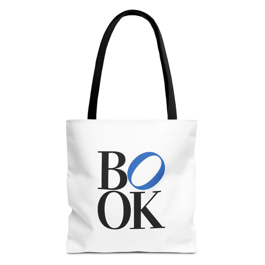 White tote bag with 'BOOK' printed on it against a white background