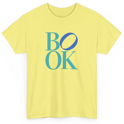 Yellow t-shirt with 'BOOK' printed in blue and teal on a white background
