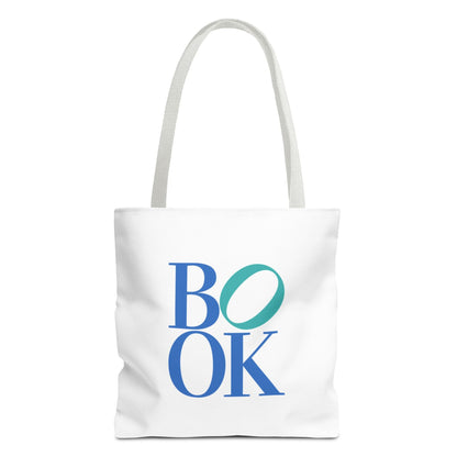 White tote bag with 'BOOK' printed in blue and green on a white background