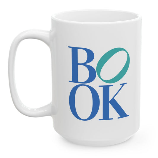 White mug with 'BOOK' in blue and green on a white background