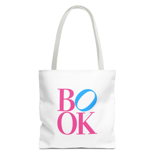 White tote bag with 'BOOK' printed in pink and blue on a white background