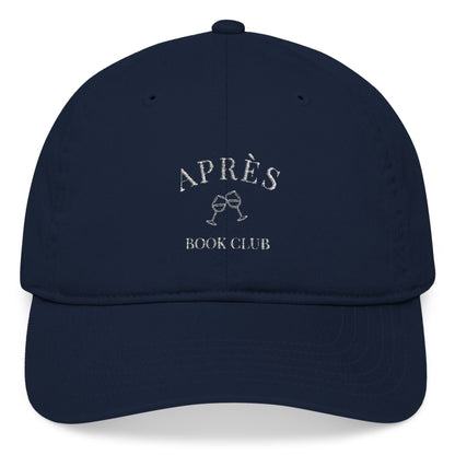 Navy blue cap with 'APRÈS BOOK CLUB' text on a white background
