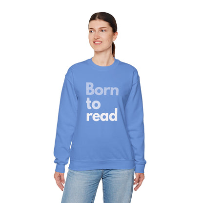 Person wearing a blue sweatshirt with 'Born to read' text on a white background